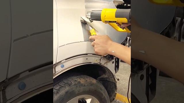 The process of removing paint from a car The process of removing paint from a car