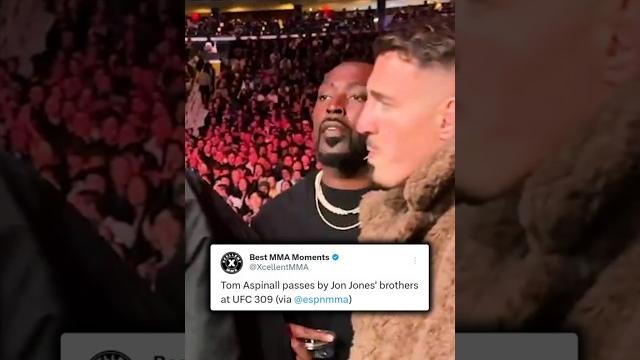 Tom Aspinall walks by Jon Jones' family at UFC 309 Tom Aspinall walks by Jon Jones' family at UFC 309