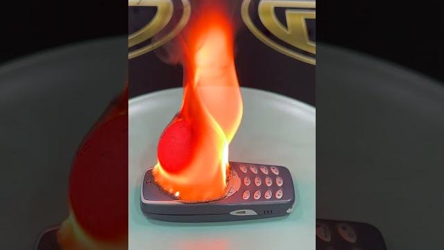 Nokia 3310 versus Red Hot Ball Nokia 3310 versus Red Hot Ball