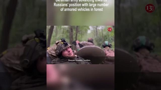 Ukrainian army advancing towards Russians’ position with large number of armored vehicles in forest Ukrainian army advancing towards Russians’ position with large number of armored vehicles in forest