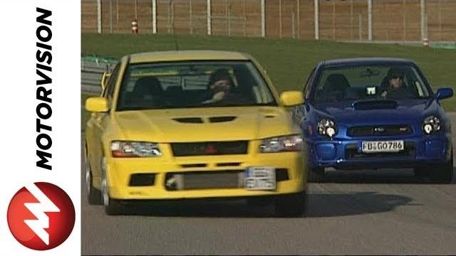 Mitsubishi Evo 7 vs. Subaru WRX STI Mitsubishi Evo 7 vs. Subaru WRX STI