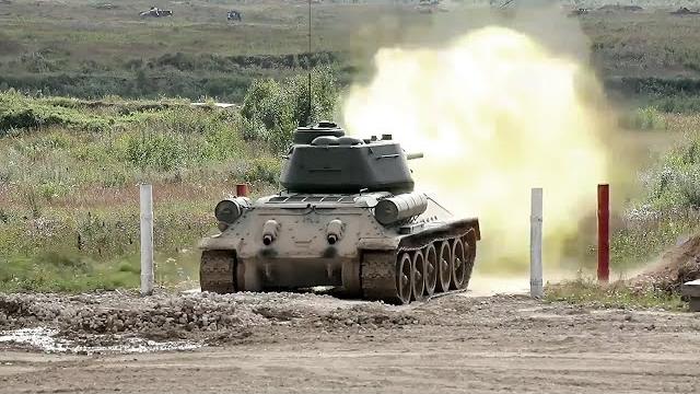 Legendary T-34 Tank In Action During Live Fire Legendary T-34 Tank In Action During Live Fire