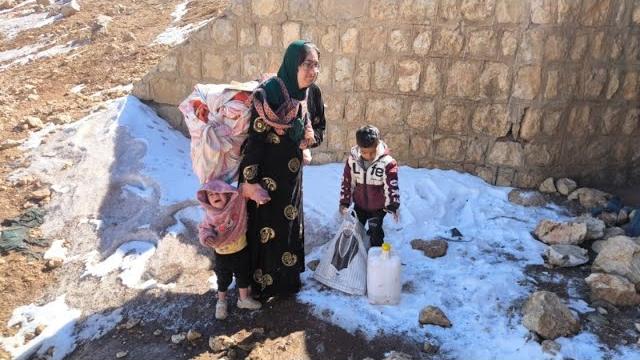 Batool Returns from Work to Face the Shadow of Threats A Mother's Strength Amid Fear andCement Walls Batool Returns from Work to Face the Shadow of Threats A Mother's Strength Amid Fear andCement Walls