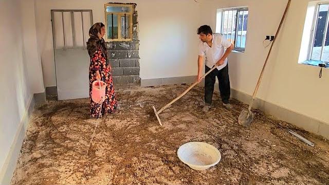 "Leveling the house to prepare cement and cooking stuffed fish with the hands of the artist Razia" "Leveling the house to prepare cement and cooking stuffed fish with the hands of the artist Razia"