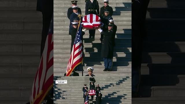 Former President Jimmy Carter’s casket is carried out of the U.S. Capitol for the last time. Former President Jimmy Carter’s casket is carried out of the U.S. Capitol for the last time.